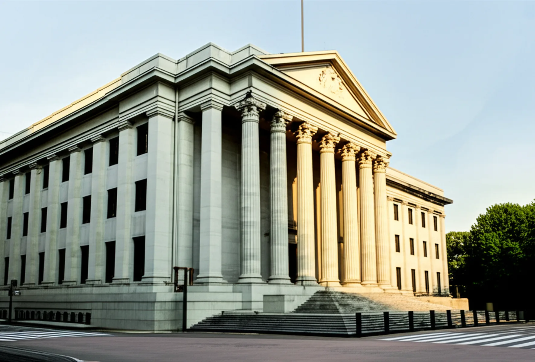 日銀政策金利0.75%据え置きの本質と今後の見通し - 日本銀行本店の外観と青空、重厚な石造りの建物を正面から捉えたショット