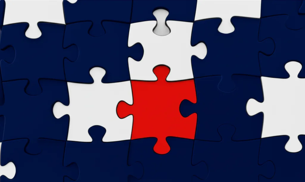 NISA改正2026の論点を整理｜こどもNISA・金融所得課税の行方 - 複数のパズルピースが組み合わさる瞬間を上から撮影したシーン