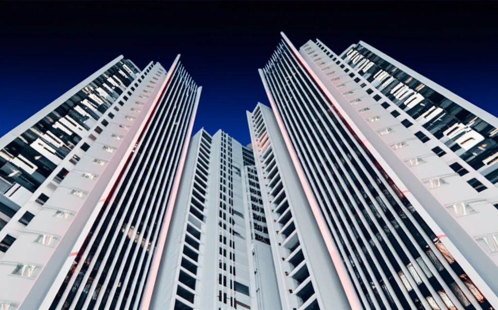 標準報酬月額の上限引き上げで年11万円負担増の全貌 - 都心の高層マンション群と夕暮れの空、経済的な豊かさと複雑さを感じさせる構図